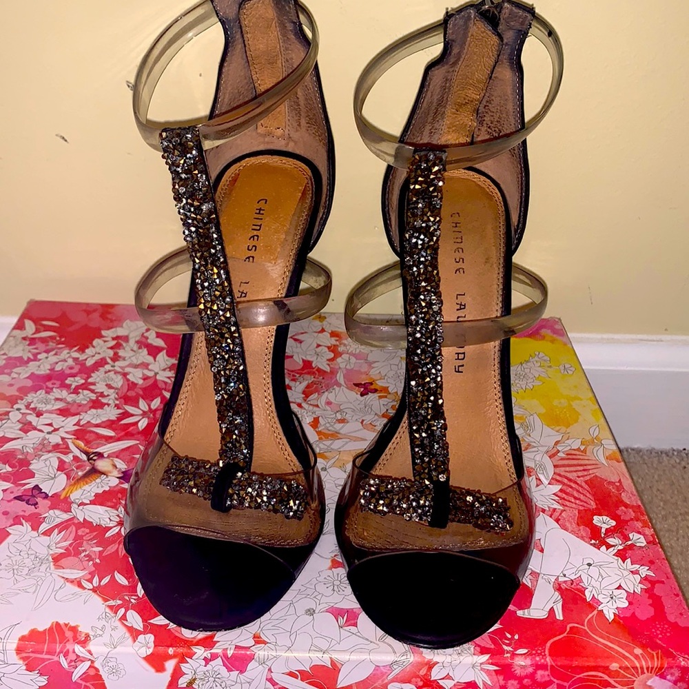 Chinese Laundry clear & black heels with black & gold embellishments. Size 7.5